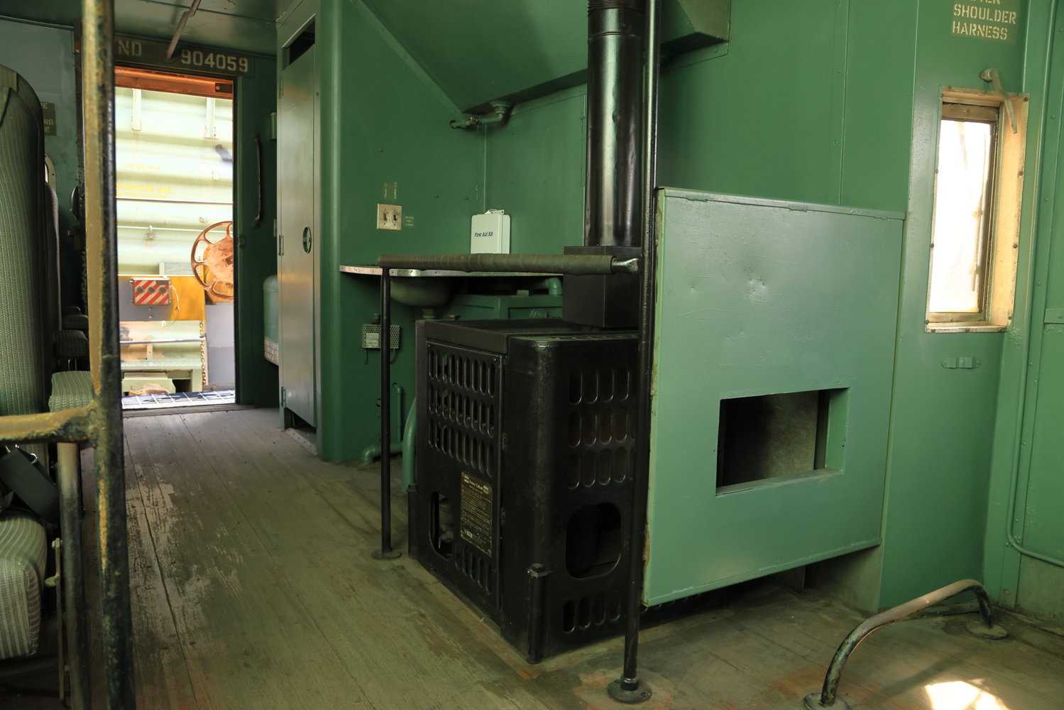 Inside Caboose No. 904059,  showing the onboard oil-fired stove.
